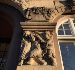 Detail at the entrance to high school incl. the school building